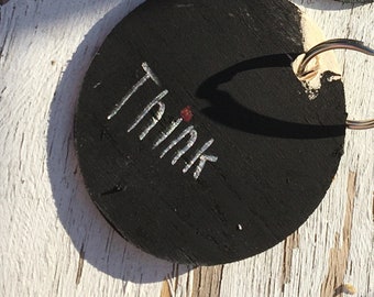 Micro sized "Think" circular keychain