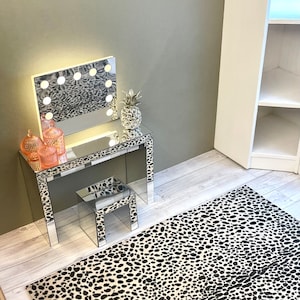 Dollshouse Miniature modern one twelfth scale leopard print rug for room boxes, dioramas and dollshouses.