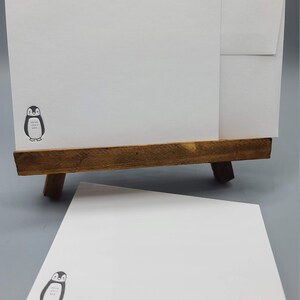 Juego de tarjetas con adorables pingüinos impresos en tipografía