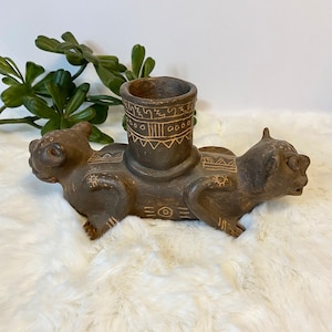 Vintage terracotta vessel, double headed creature