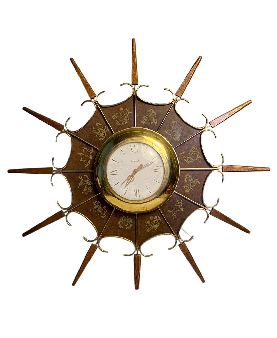 Mid Century Sunburst Form Wall Clock by United C 1950/1960's