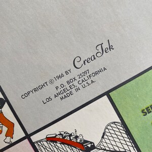 May include: A vintage game board with the text "COPYRIGHT &copy; 1966 BY Crea Tek P.O. BOX 25297 LOS ANGELES, CALIFORNIA MADE IN U.S.A.". The board features a black and white illustration of a roller coaster.