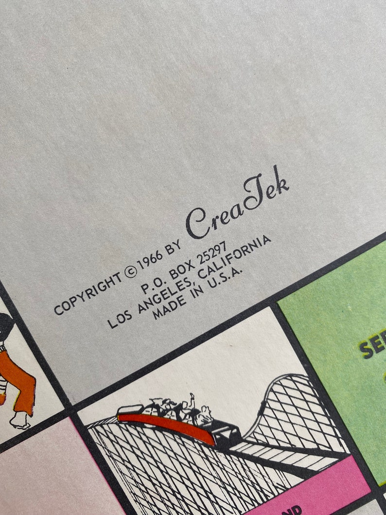 May include: A vintage game board with the text "COPYRIGHT &copy; 1966 BY Crea Tek P.O. BOX 25297 LOS ANGELES, CALIFORNIA MADE IN U.S.A.". The board features a black and white illustration of a roller coaster.