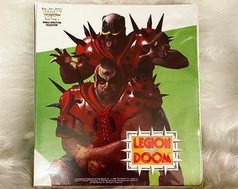 Vintage 1990 WWF wrestling cards and binder