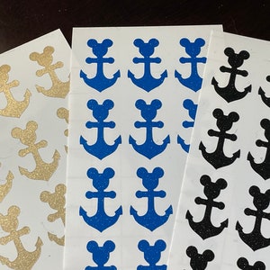 May include: Three sheets of stickers with anchor designs. The anchors are blue, gold, and black with glitter. Each sheet has multiple anchors.