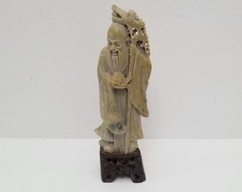 Vintage Chinese Red Resin Immortal Figurine with Child and Crane From...
