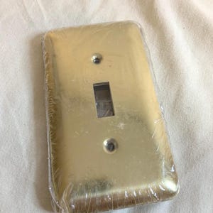 NOS Brass/Gold Metal Switch Covers (American Tack&Hardware)6 per pack