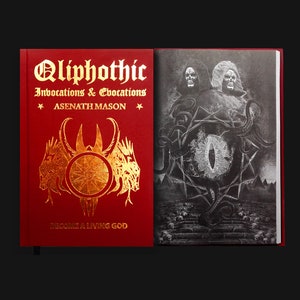 May include: A red hardcover book with gold lettering titled "Qliphothic Invocations & Evocations" by Asenath Mason. The book cover features a gold illustration of a wheel with three heads and the text "Become a Living God". The back cover shows a black and white illustration of a large eye with tentacles.