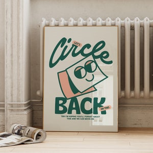 May include: A framed poster with the words "Let's Circle Back" in green and the word "BACK" in black. The poster has a light beige background and features a cartoon image of a notepad with eyes. The text "TBH I'M HOPING YOU'LL FORGET ABOUT THIS AND WE CAN MOVE ON" is also included.