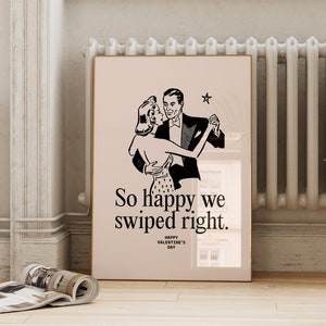 Pode incluir: Uma ilustração em preto e branco de um casal dançando com o texto "So happy we swiped right." e "Happy Valentine's Day" impresso abaixo. A ilustração está sobre um fundo rosa.