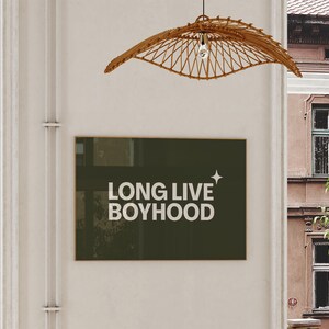 Horizontal long live boyhood print in dark olive green. Green background, white typography in the foreground. Perfect for boys room or nursery.
