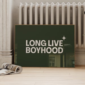 Horizontal long live boyhood print in dark olive green. Green background, white typography in the foreground. Perfect for boys room or nursery.