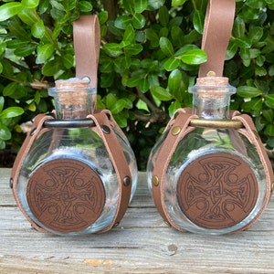 Potion bottle with leather medallion