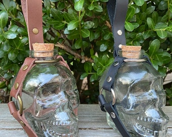 Glass Skull Potion Bottle with Leather Straps, Accent Rings and Color Matching Rivets.