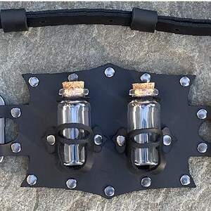 Leather Alchemy Bandoiler with gunmetal color hardware