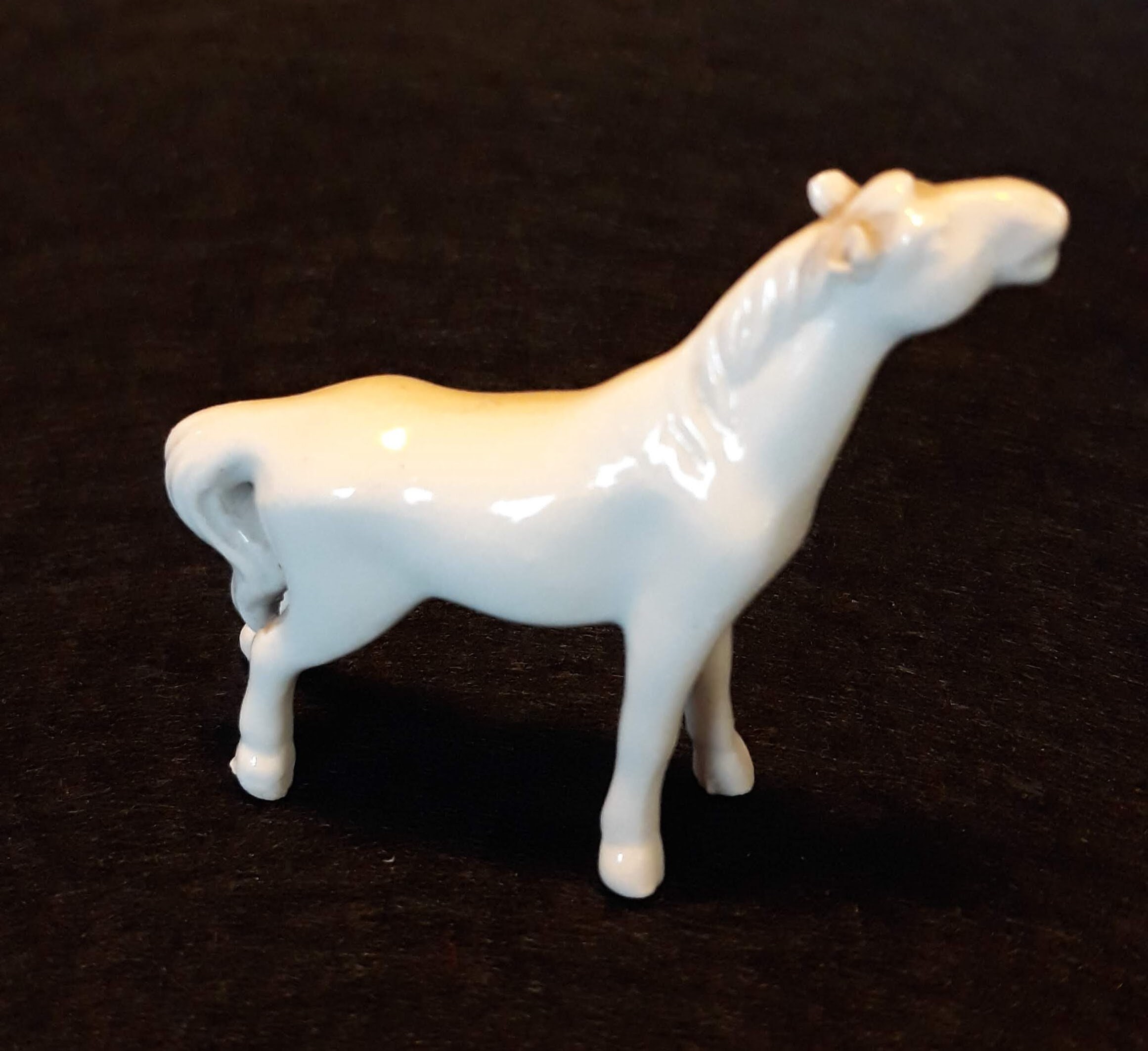 white porcelain horse statue