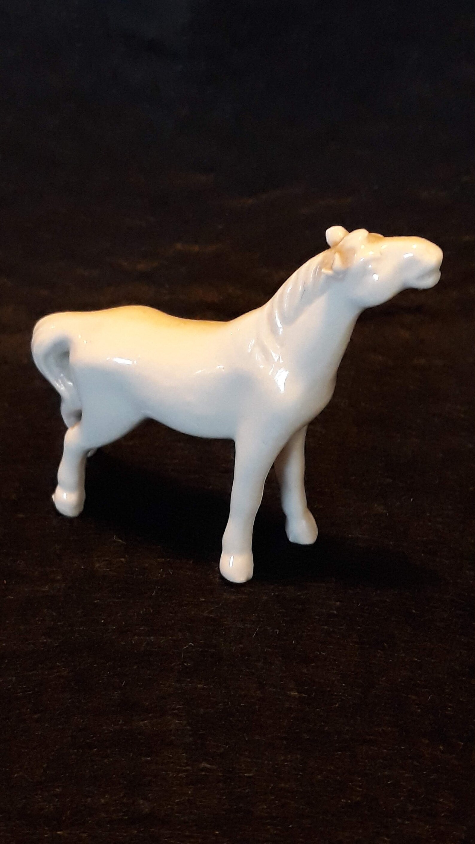 white porcelain horse statue