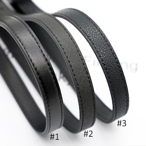 May include: Close-up of three black leather straps with different textures. Strap #1 has a smooth finish, #2 has a crosshatch pattern, and #3 has a pebbled texture. All straps are stitched along the edges.