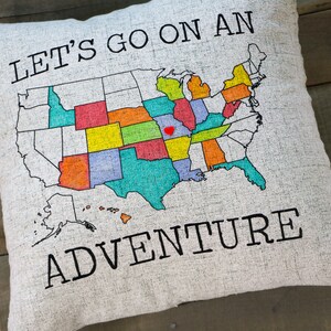 Example of how the DIY Adventure pillow looks with a 18x18 pillow insert and with some states colored in with bright makers.