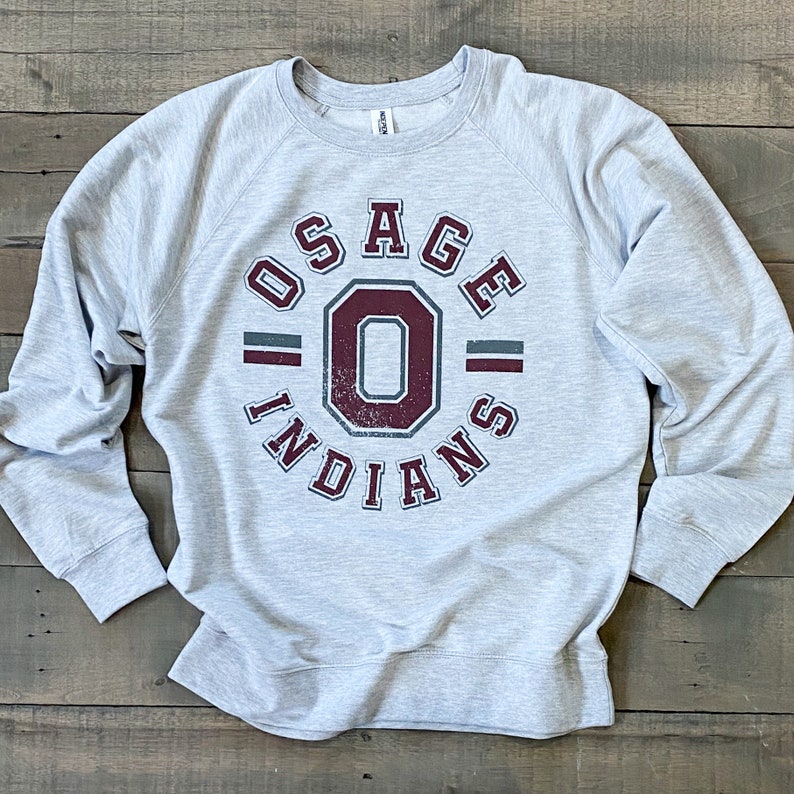 May include: Gray sweatshirt with a maroon and gray graphic print of "Osage Indians" with a large "O" in the center.