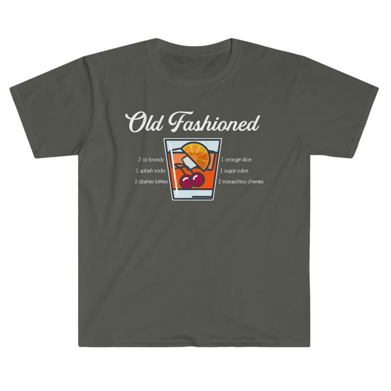 May include: A dark gray t-shirt with the text "Old Fashioned" and a graphic of an old fashioned cocktail with the ingredients listed below: 2 oz brandy, 1 splash soda, 2 dashes bitters, 1 orange slice, 1 sugar cube, 2 maraschino cherries.