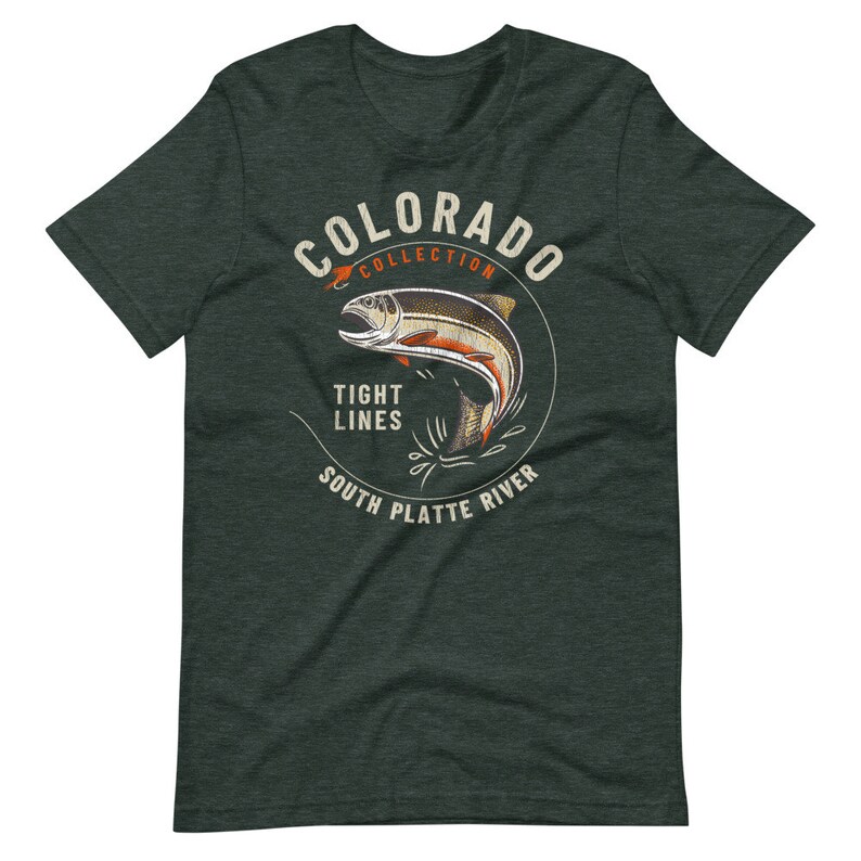 May include: A green t-shirt with a vintage-style illustration of a trout jumping out of the water. The illustration is surrounded by a circle with the text "Colorado Collection", "Tight Lines", and "South Platte River".