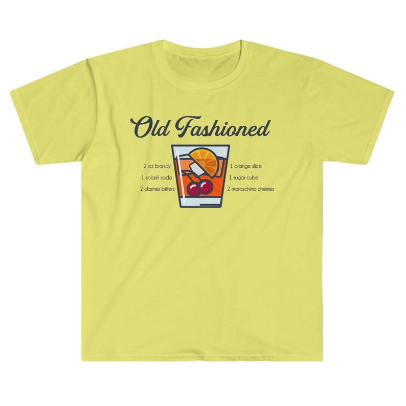May include: Yellow t-shirt with a graphic of an Old Fashioned cocktail and the ingredients listed: 2 oz brandy, 1 splash soda, 2 dashes bitters, 1 orange slice, 1 sugar cube, 2 maraschino cherries.