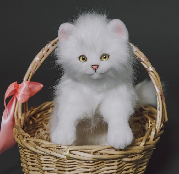 white cat doll