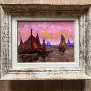 Vintage oil on board in wooden frame. Signed.