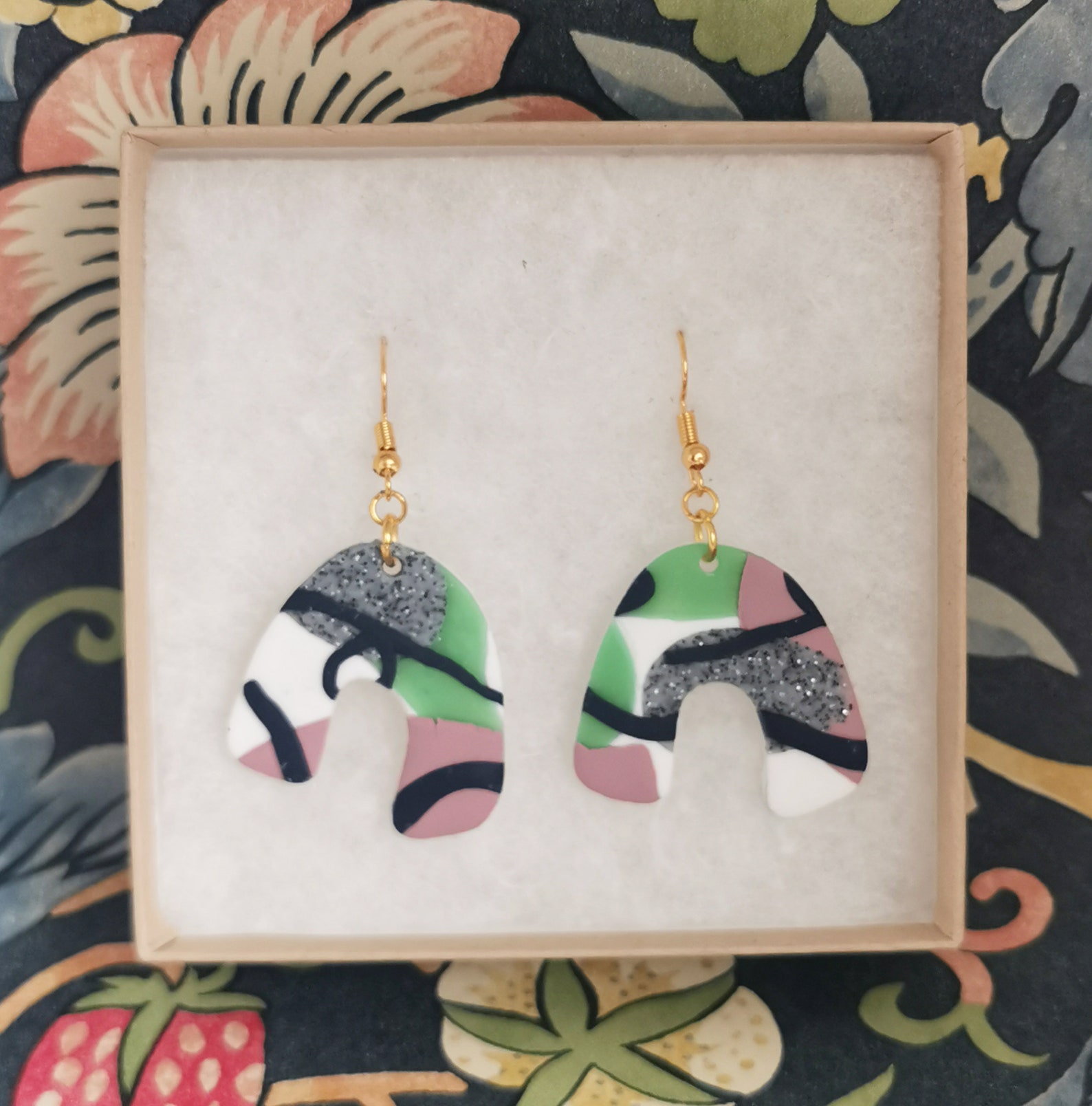 colourful earrings in a box