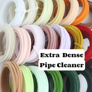 May include: An assortment of extra dense pipe cleaners in a range of colours, such as white, cream, pink, lilac, yellow, orange, red, green, and brown. The text "Extra Dense Pipe Cleaner" is displayed on a white background.