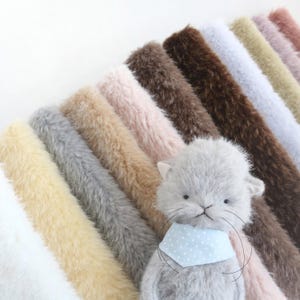 Tela de pelo sintético para peluches de 20 mm de largo, ideal para la fabricación de peluches y ositos de peluche.