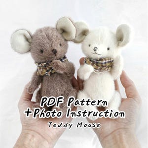 May include: Two plush teddy mouse toys, one brown and one white, each featuring large rounded ears and a small plaid scarf around the neck. The text PDF Pattern + Photo Instruction Teddy Mouse is overlaid in black on the center of the image.