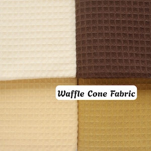May include: A collection of four fabric swatches featuring a waffle weave texture in cream, dark brown, light beige, and mustard yellow. A white rectangular label with black text reads Waffle Cone Fabric across the centre of the image.