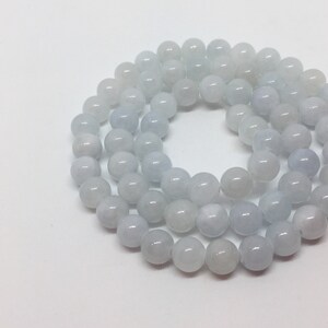 Rainvow Jade stones - smooth blue - 6mm