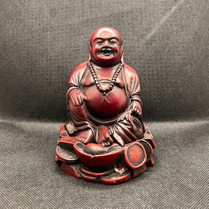 Laughing buddha incense burner