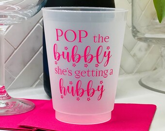 Kubeczki na wieczór panieński: różowe plastikowe kubeczki „Pop the Bubbly” – zestaw 10 sztuk