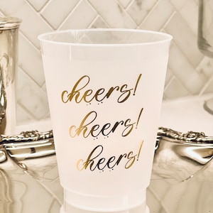 Cheers!  Classic design printed in gold / 16oz plastic cups