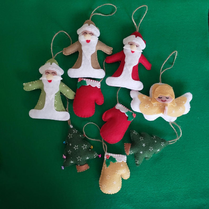 This 100/% handmade adorable felt Christmas tree with star prints is the perfect addition to your Christmas tree ornaments.