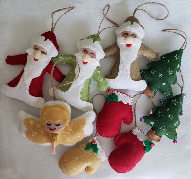 This 100/% handmade adorable felt Christmas tree with star prints is the perfect addition to your Christmas tree ornaments.