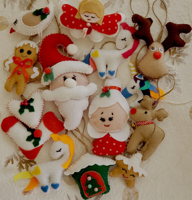 This 100/% handmade adorable felt Christmas tree with star prints is the perfect addition to your Christmas tree ornaments.