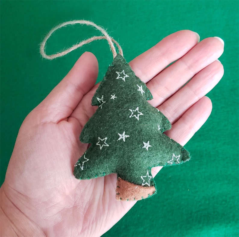 This 100/% handmade adorable felt Christmas tree with star prints is the perfect addition to your Christmas tree ornaments.