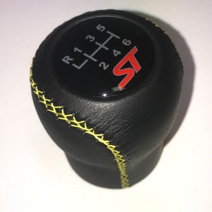 Gear shift knob fits for Ford  FIESTA , FOCUS, Cuga st logo 6 speed. Black with Red ST label. Stitching color -Yellow