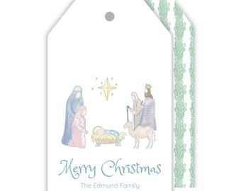May include: White Christmas gift tags featuring a watercolour illustration of the Nativity scene, including Mary, Joseph, baby Jesus, and the Three Wise Men. The text "Merry Christmas" is written in a script font, with "The Edmund Family" below.