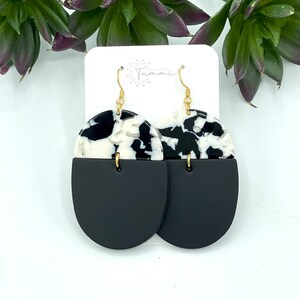 Black and white acrylic and leather oblong earrings