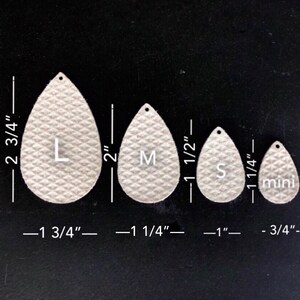 May include: Four leather teardrop shapes in different sizes, labeled "L", "M", "S", and "mini". The shapes are 2 3/4 inches, 2 inches, 1 1/2 inches, and 1 1/4 inches in length.