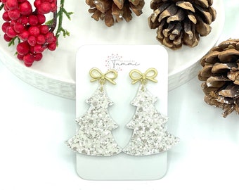 White chunky glitter backed with leather w/gold bow Christmas tree earrings