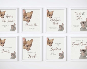 May include: Eight printable signs featuring Bambi and Thumper from Disney's Bambi. The signs are in a white frame and have a light brown background. The signs include text such as "Babies Are Sweet", "Please Take A Treat", "Momosa Bar", "Please Take A Favor", "Please Enjoy Some Food", "Welcome To Sophia's Baby Shower", "Please Sign Our Children's Book", "Cards & Gifts", and "Please Sign The Guest Book".