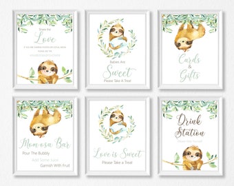 May include: Six printable signs featuring sloths and greenery. The signs include the text "Share the Love", "Babies Are Sweet", "Cards & Gifts", "Mom-osa Bar", "Love is Sweet", and "Drink Station".