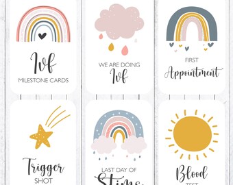 Peut inclure: Six cartes illustrées avec des motifs d'arc-en-ciel, de nuage, de soleil et d'étoile. Les cartes comportent le texte suivant : "IVF Milestone Cards", "We are doing IVF", "First Appointment", "Trigger Shot", "Last Day of Stims", et "Blood Test".